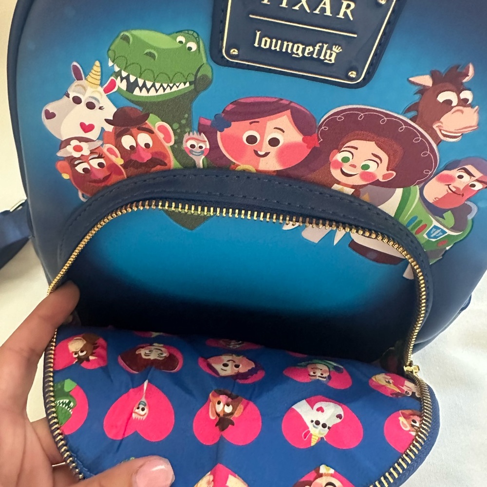 LOUNGEFLY PIXAR MOMEMT TOY STORY WOODY, BO PEEP, & TOYS BACKPACK - Picture 3 of 9